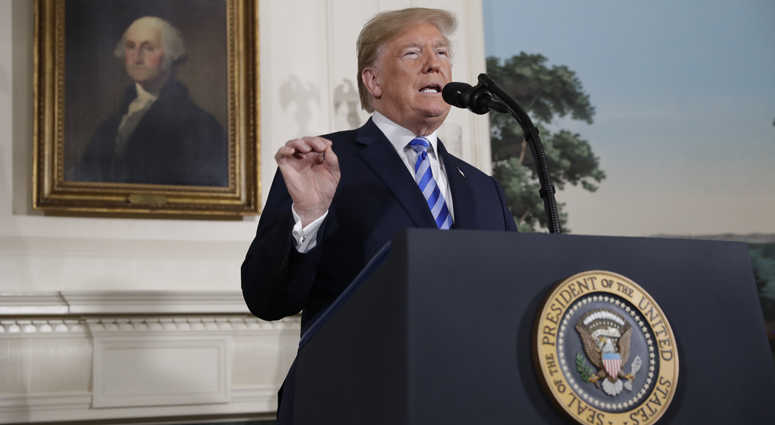President Donald Trump delivers a statement on the Iran nuclear deal from the Diplomatic Reception Room of the White House, Tuesday, May 8, 2018, in Washington. Donald Trump