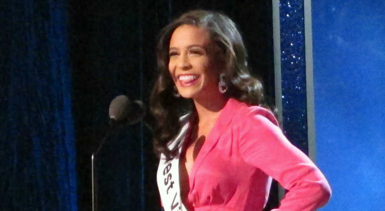 Miss West Virginia Madeline Collins introduces herself during the third and final night of preliminary competition in the Miss America pageant in Atlantic City N.J. on Friday Sept. 7, 2018 Miss West Virginia