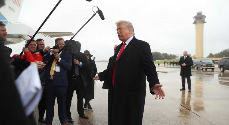 Trump talks with reporters after the shooting. trump synagogue shooting