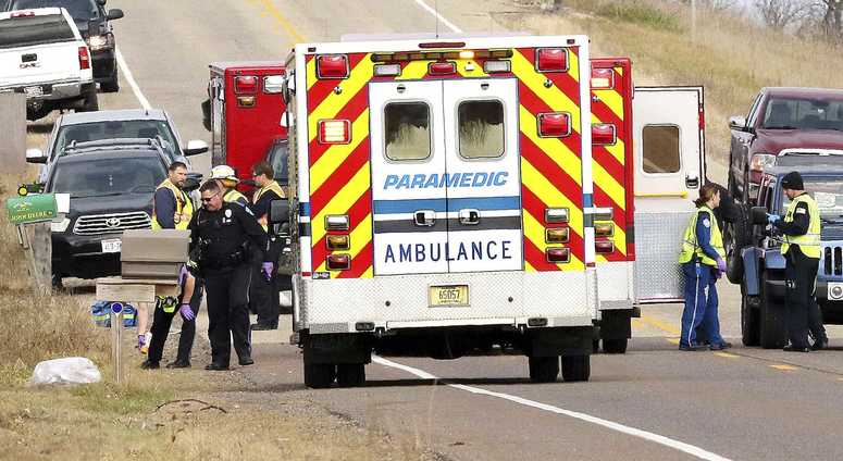 Emergency medical personnel gather at the scene of a hit-and-run accident Saturday, Nov. 3, 2018, in Lake Hallie, Wis., that killed two girls and an adult. Girl Scouts killed crash