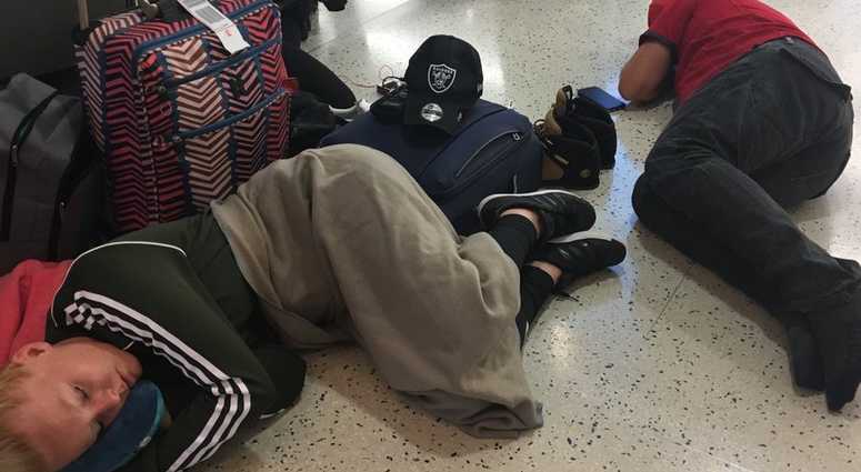 British Airways passengers were stranded at JFK Airport overnight Friday. stranded british airways passengers jfk