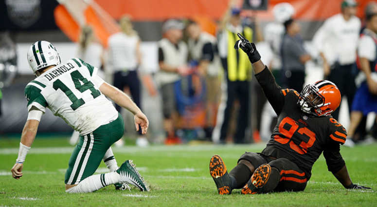 Trevon Coley #93 of the Cleveland Browns celebrates in front of Sam Darnold #14 of the New York Jets Trevon Coley #93 of the Cleveland Browns celebrates in front of Sam Darnold #14 of the New York Jets