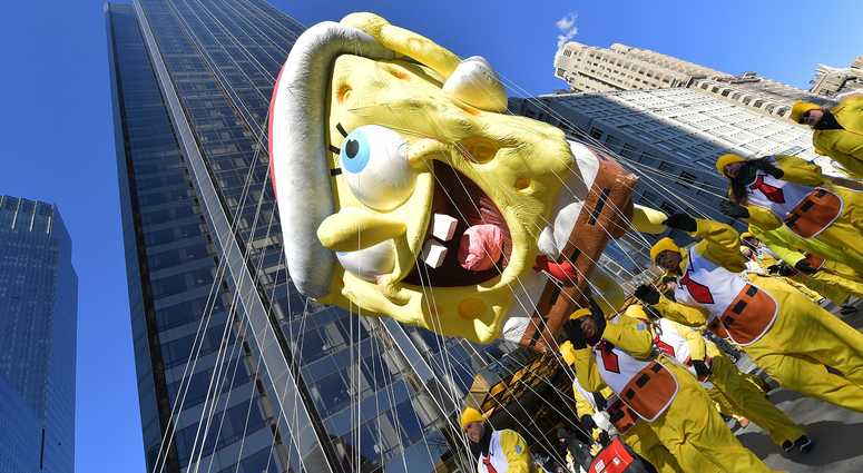 The SpongeBob SquarePants balloon floats along the parade route during the 2018 Macy's Thanksgiving Day Parade on November 22, 2018 in New York City. Thanksgiving Day Parade 2018