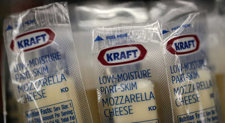Packages of Kraft mozzarella cheese are displayed on a grocery store shelf on February 22, 2019 Packages of Kraft mozzarella cheese are displayed on a grocery store shelf on February 22, 2019