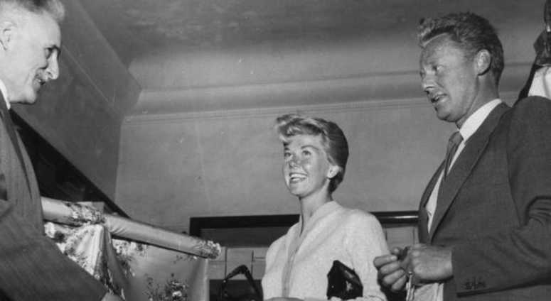 3rd May 1955: American film actress and singer Doris Day, shopping with Van Johnson in the Italian Riviera resort of San Remo. 3rd May 1955: American film actress and singer Doris Day, shopping with Van Johnson in the Italian Riviera resort of San Remo.