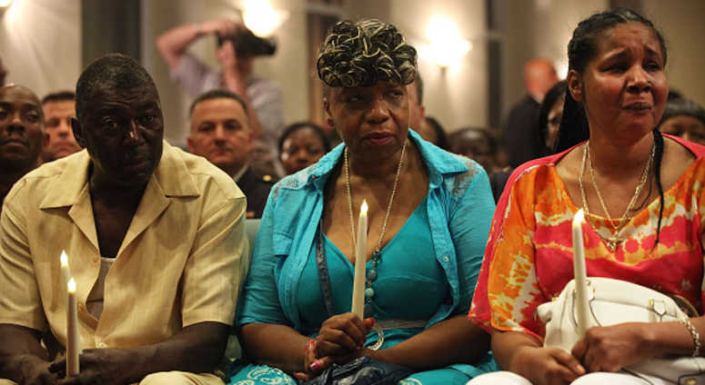 Eric Garner's stepfather, Benjamin Carr, mother Gwen Carr and his widow Esaw Garner (R) Eric Garner's stepfather, Benjamin Carr, mother Gwen Carr and his widow Esaw Garner (R)