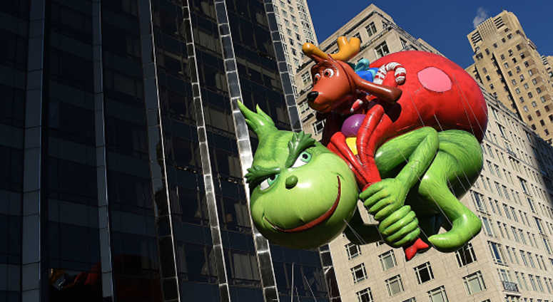 The Dr. Seuss Grinch and Max balloon floats down Central Park West and into Columbus Circle during the 91st Annual Macy's Thanksgiving Day Parade on November 22, 2017 in New York City. The Dr. Seuss Grinch and Max balloon floats down Central Park West and into Columbus Circle during the 91st Annual Macy's Thanksgiving Day Parade on November 22, 2017 in New York City.