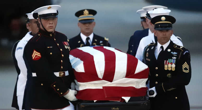 A military honor guard carries the casket of Sen. John McCain, R-Ariz., after a memorial service at North Phoenix Baptist Church Thursday, Aug. 30, 2018, in Phoenix. A military honor guard carries the casket of Sen. John McCain, R-Ariz., after a memorial service at North Phoenix Baptist Church Thursday, Aug. 30, 2018, in Phoenix.