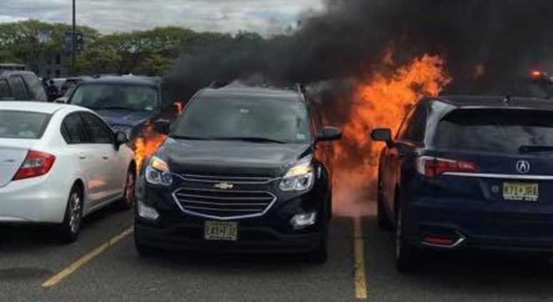 Seven vehicles were damaged after drivers parked on top of hot coals at the Meadowlands on Sunday. Seven vehicles were damaged after drivers parked on top of hot coals at the Meadowlands on Sunday.