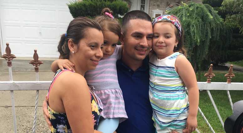 Pablo Villavicencio poses with his wife and 2 daughters outside their Hempstead home. Pablo Villavicencio poses with his wife and 2 daughters outside their Hempstead home.