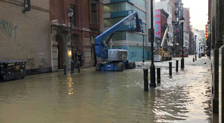 Water covers a street after a water main broke in Philadelphia on Tuesday morning July 3, 2018. The break happened before 4 a.m. Tuesday, and a number of center city streets have been closed. Water covers a street after a water main broke in Philadelphia on Tuesday morning July 3, 2018. The break happened before 4 a.m. Tuesday, and a number of center city streets have been closed.