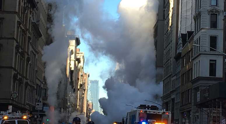 The scene following a steam pipe explosion in the Flatiron district. The scene following a steam pipe explosion in the Flatiron district.