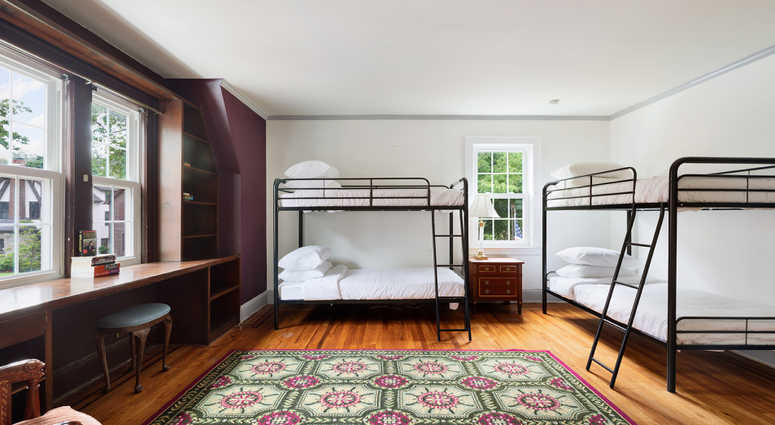A bedroom. Trump Home Compass