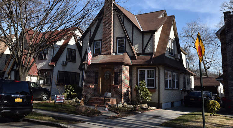 The exterior of the Jamaica Estates home in Queens. Trump Home Compass