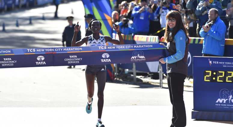 Mary Keitany crosses the finish line to win the professional women's division of the 2018 TCS New York City Marathon. NYC Marathon