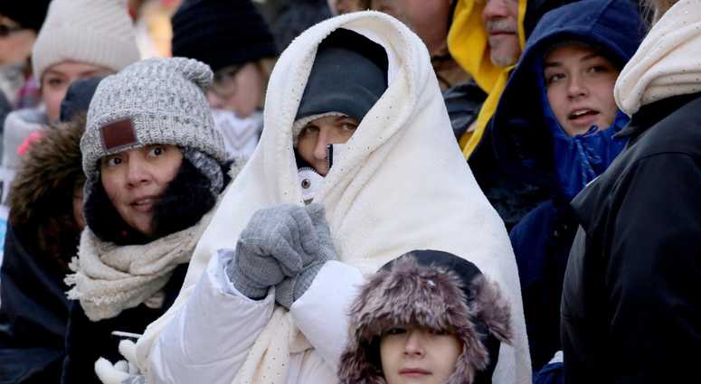 Spectators wrapped themselves in layers as they watched the annual Macy's Thanksgiving Day Parade in Manhattan Nov. 22, 2018. Thanksgiving Parade