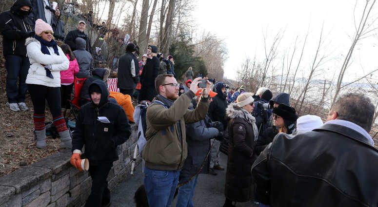 Spectators wait at the Riverwalk to get a view of the demolition of the eastern portion of the Tappan Zee Bridge Jan. 15, 2019 in Tarrytown. Tappan Zee Demolition