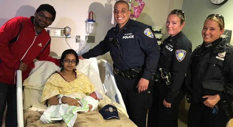 Baby, parents and PAPD Officers at Hoboken Hospital