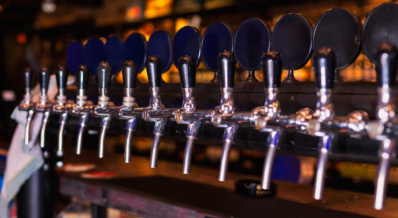 File image of beer taps at a bar. Bar taps