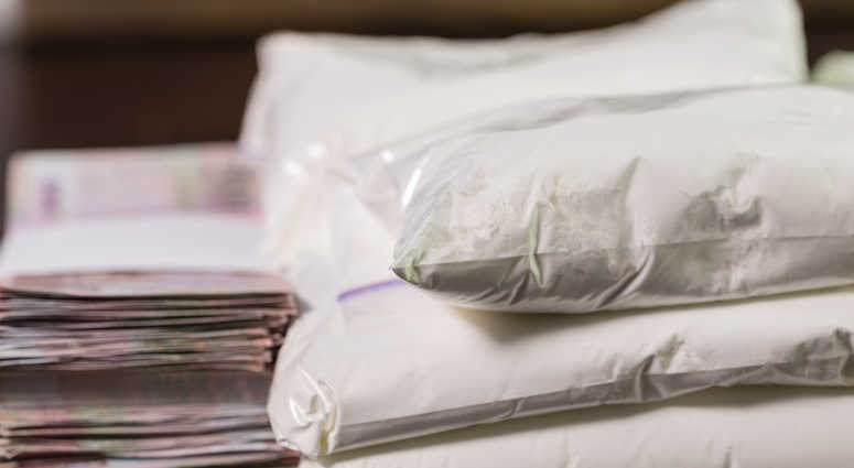 Cocaine and money file image. Cocaine and money file image.