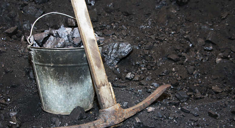 Coal and a pick axe. Coal and a pick axe