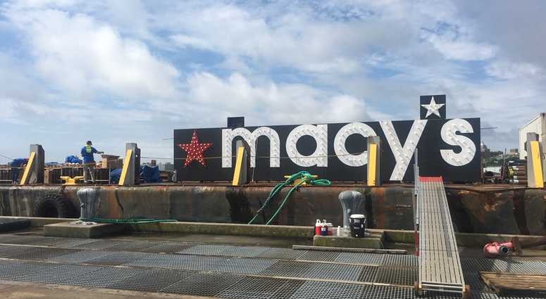 Workers prepare for the Macy's fireworks display. macy's fireworks