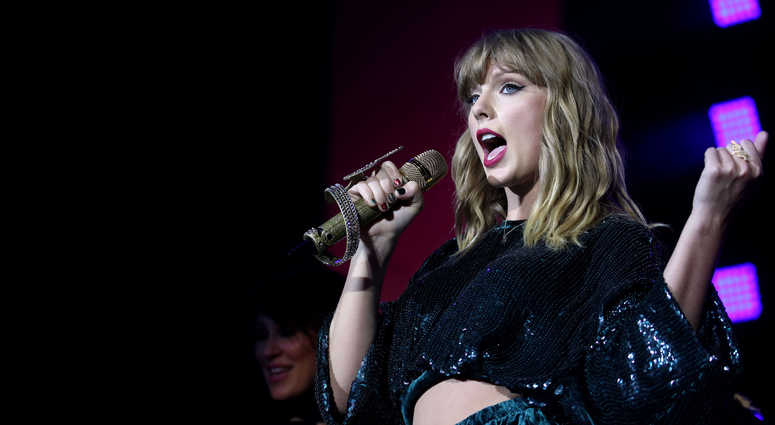 File photo dated 10/12/17 of Taylor Swift, as the US singer dances through a hotel, the subway and a rain-soaked street in her new music video Delicate as she turns invisible. File photo dated 10/12/17 of Taylor Swift, as the US singer dances through a hotel, the subway and a rain-soaked street in her new music video Delicate as she turns invisible.