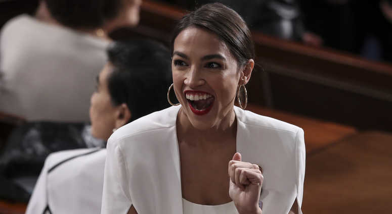 Rep. Alexandria Ocasio-Cortez, D-N.Y., reacts during President Donald Trump's State of the Union address to a joint session of Congress in the chamber of the U.S. House of Representatives on February 5, 2019 in Washington, DC. Alexandria Ocasio-Cortez