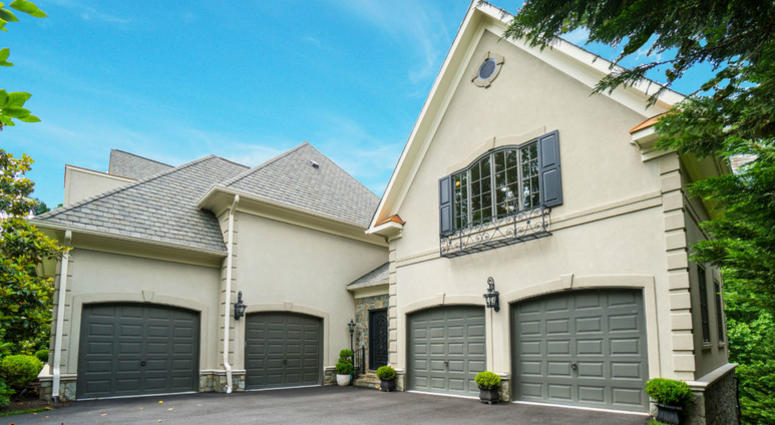 Four-car garage at Bruce Allen's home. Bruce Allen's McLean, Virginia mansion is up for sale again.