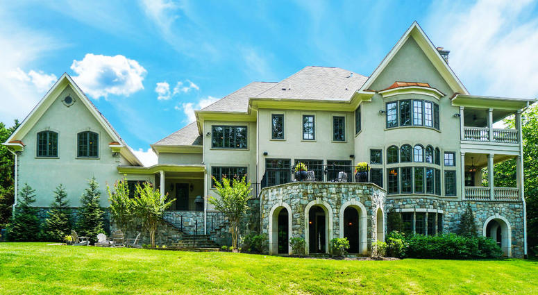 Complete look of back of Bruce Allen's home. Bruce Allen's McLean, Virginia mansion is up for sale again.