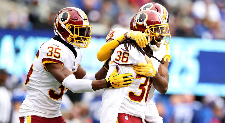 Swearinger celebrates with Redskins teammates after picking off Eli Manning DJ_Swearinger_two_interceptions