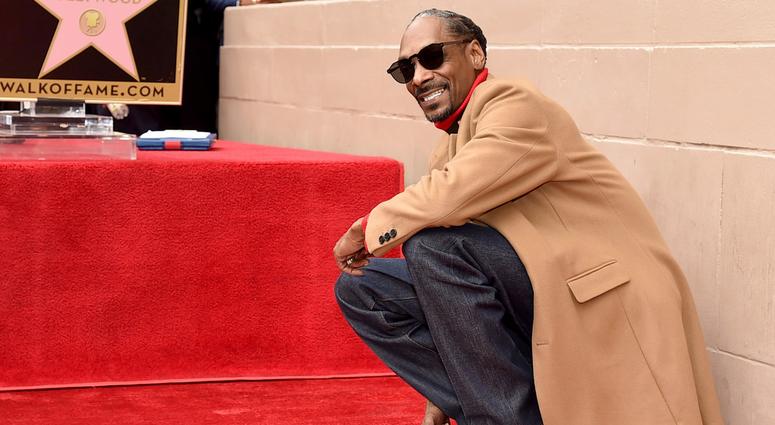 He has his own star on The Hollywood Walk Of Fame, so yeah, Snoop Dogg passes the test. Barely. PHOTOS: Danny Rouhier approved Super Bowl acts