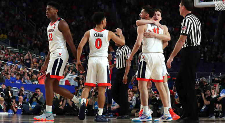 The Virginia Cavaliers celebrate during their Final Four win over Auburn. Virginia_Cavaliers