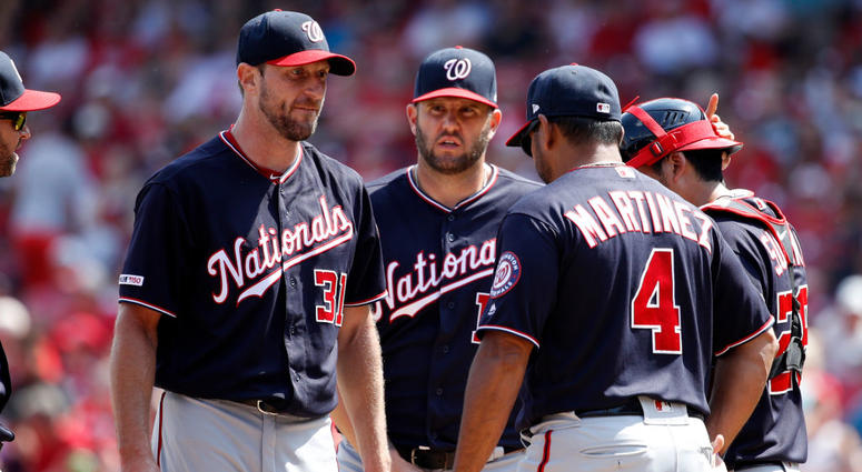 Max Scherzer and Dave Martinez meet at the pitcher's mound. Max_Scherzer_Davey_Martinez