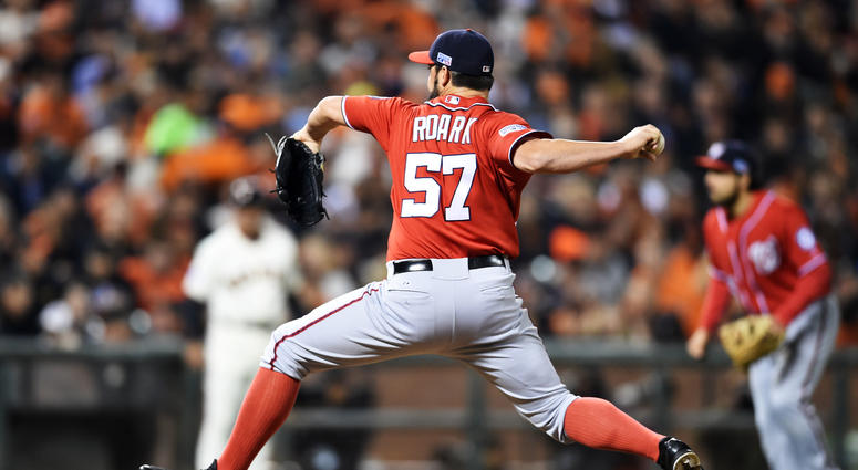 Tanner Roark pitching in Game 4 of the 2014 NLDS against against the Giants Nationals trade Tanner Roark to Reds for Tanner Rainey