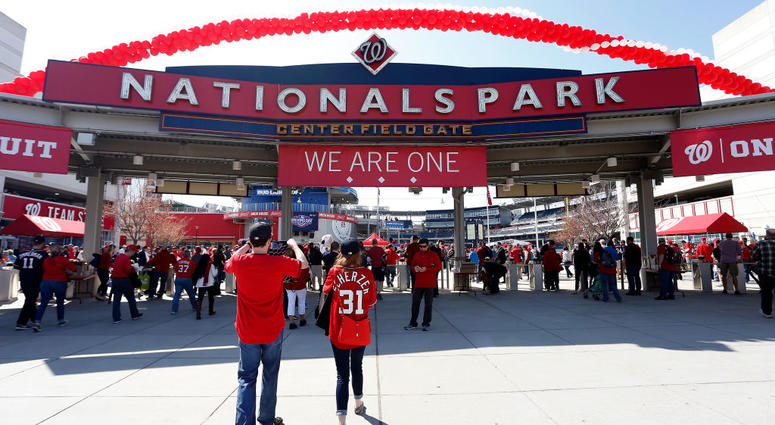 Fans walk through the Center Field Gate at Nationals Park Nationals no longer allowing backpacks at Nats Park