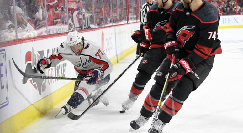 Capitals lose forward T.J. Oshie after a hit from behind by Warren Foegele Caps-Hurricanes: T.J. Oshie leaves Game 4 with injury