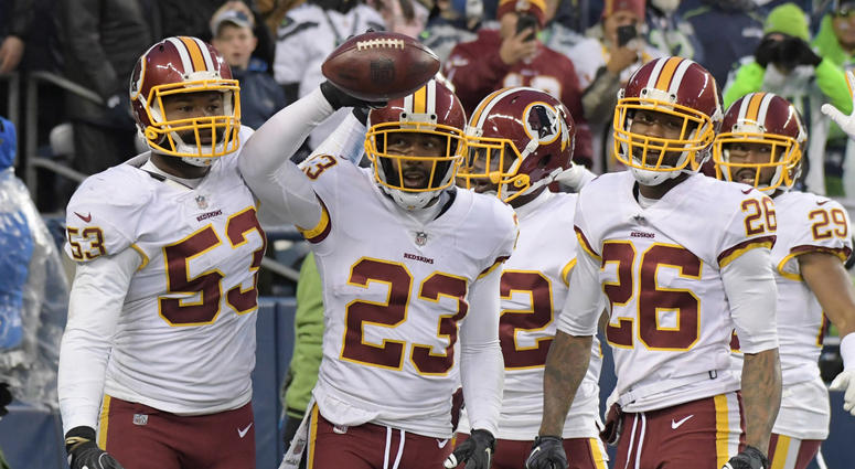 DeAngelo Hall celebrates with Redskins teammates after breaking up a pass in a 2017 win over the Seahawks. Had the Redskins hired Hall to coach their defensive backs in 2019, he would have been leading half the players on this photo. Redskins seriously considered DeAngelo Hall to coach DBs