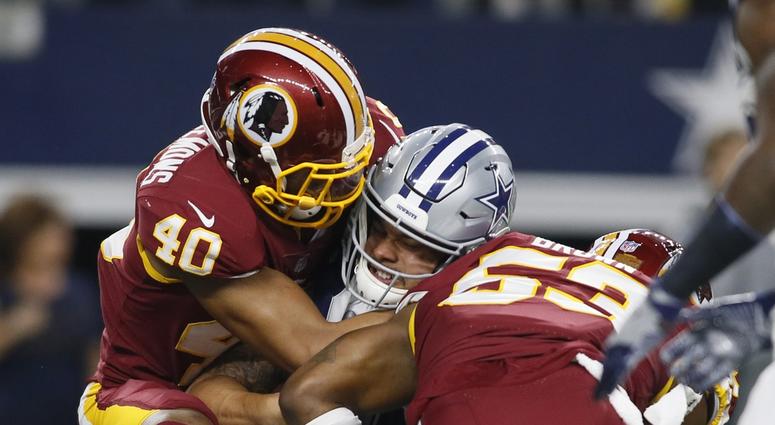 Josh Harvey-Clemons and Zach Brown sack Dak Prescott Zach_Brown_sacks_Dak_Prescott