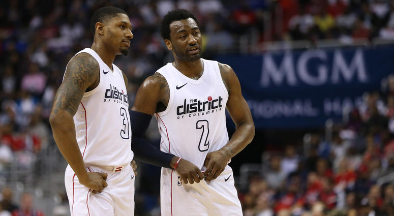 John Wall consults Bradley Beal in the first round of the playoffs John_Wall_Bradley_Beal