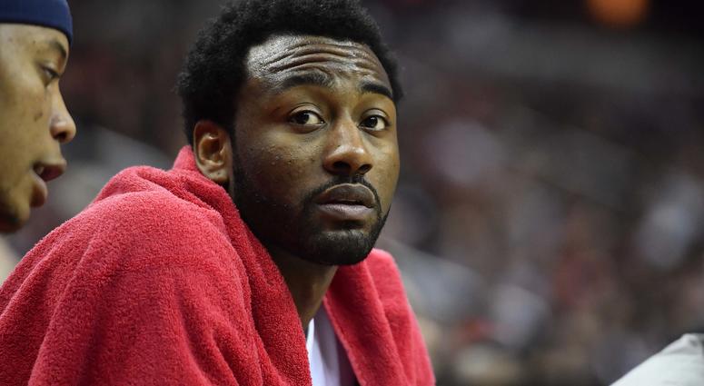 John Wall sitting on the bench. John_Wall