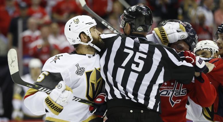 Deryk Engelland takes a jab at Nicklas Backstrom in the third period Deryk_Engelland_Nicklas_Backstrom