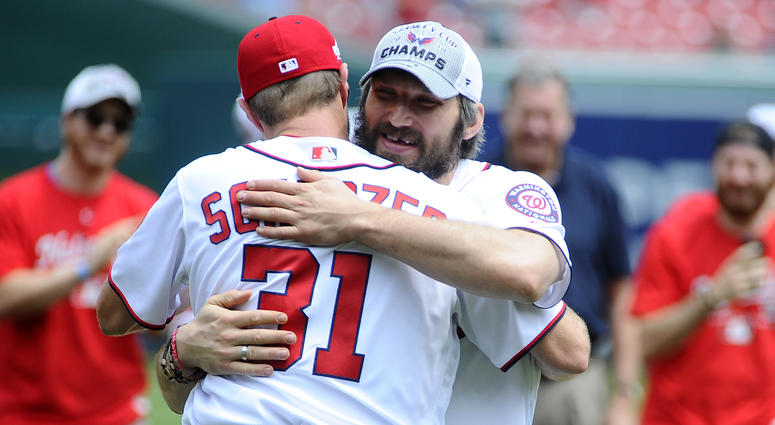 Alex Ovechkin and Max Scherzer embrace. D.C. athletes came out to support Capitals in Stanley Cup Playoffs.