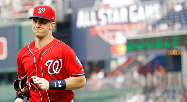 A clean-shaven Bryce Harper runs to the dugout in a June 2018 game against the Yankees Bryce_Harper_Nationals_Yankees