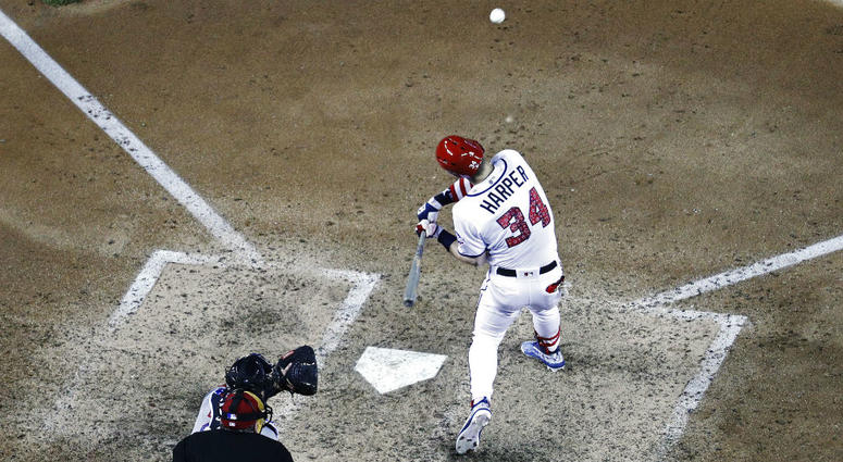 Bryce Harper hits a solo home run during the 2018 season. Bryce_Harper_Nationals