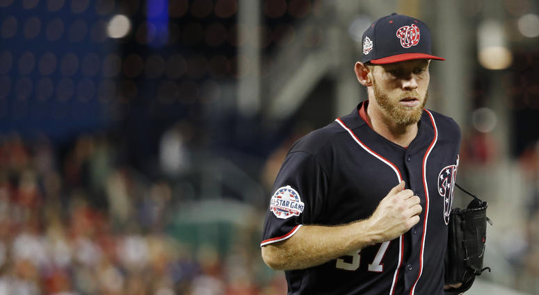 Stephen Strasburg jogs off the field. Stephen_Strasburg_Braves