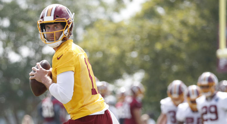 Alex Smith winds up for a long bomb at Redskins training camp Alex_Smith_Redskins_Training_Camp