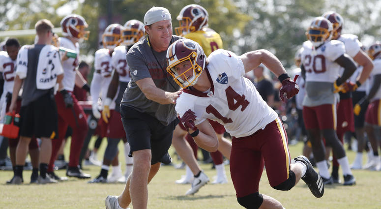 Trey Quinn runs past Redskins coach Jay Gruden Trey_Quinn_Redskins