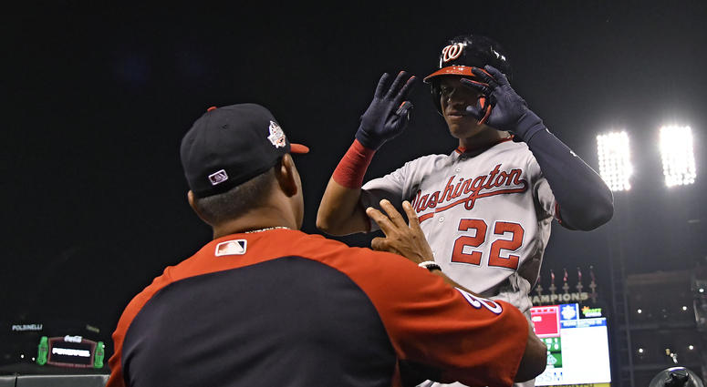 Juan Soto congratulated on a two-run homer by Dave Martinez Dave_Martinez_Nationals