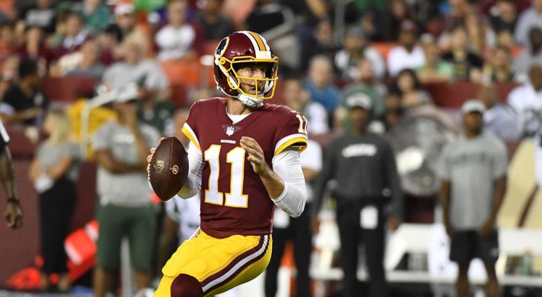Alex Smith dropping back to pass. Alex_Smith